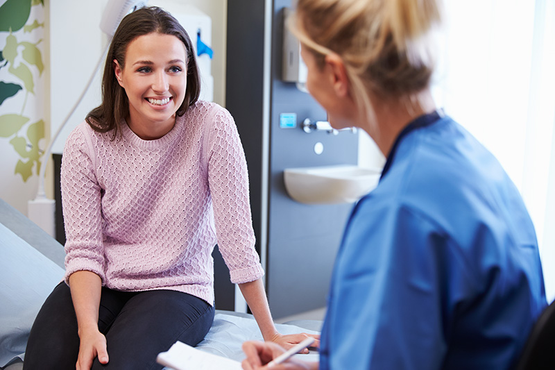 Pregnant woman getting ultrasound